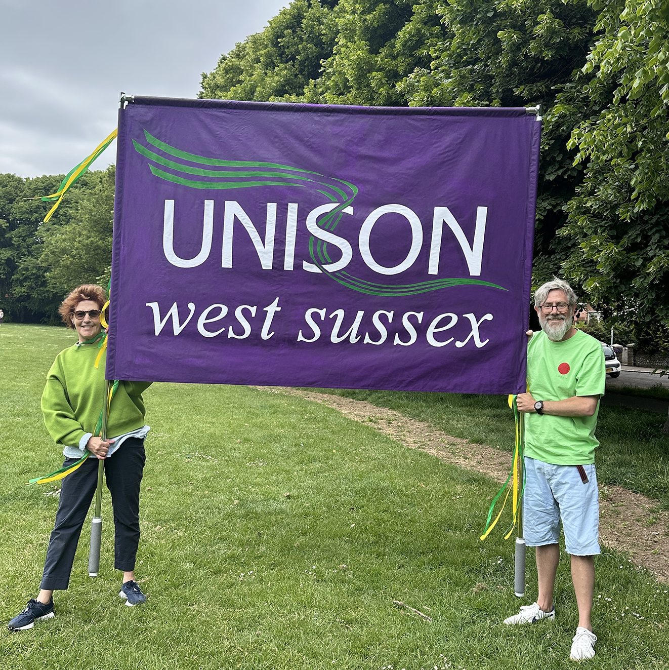 Hand-painted purple Unison West Sussex banner