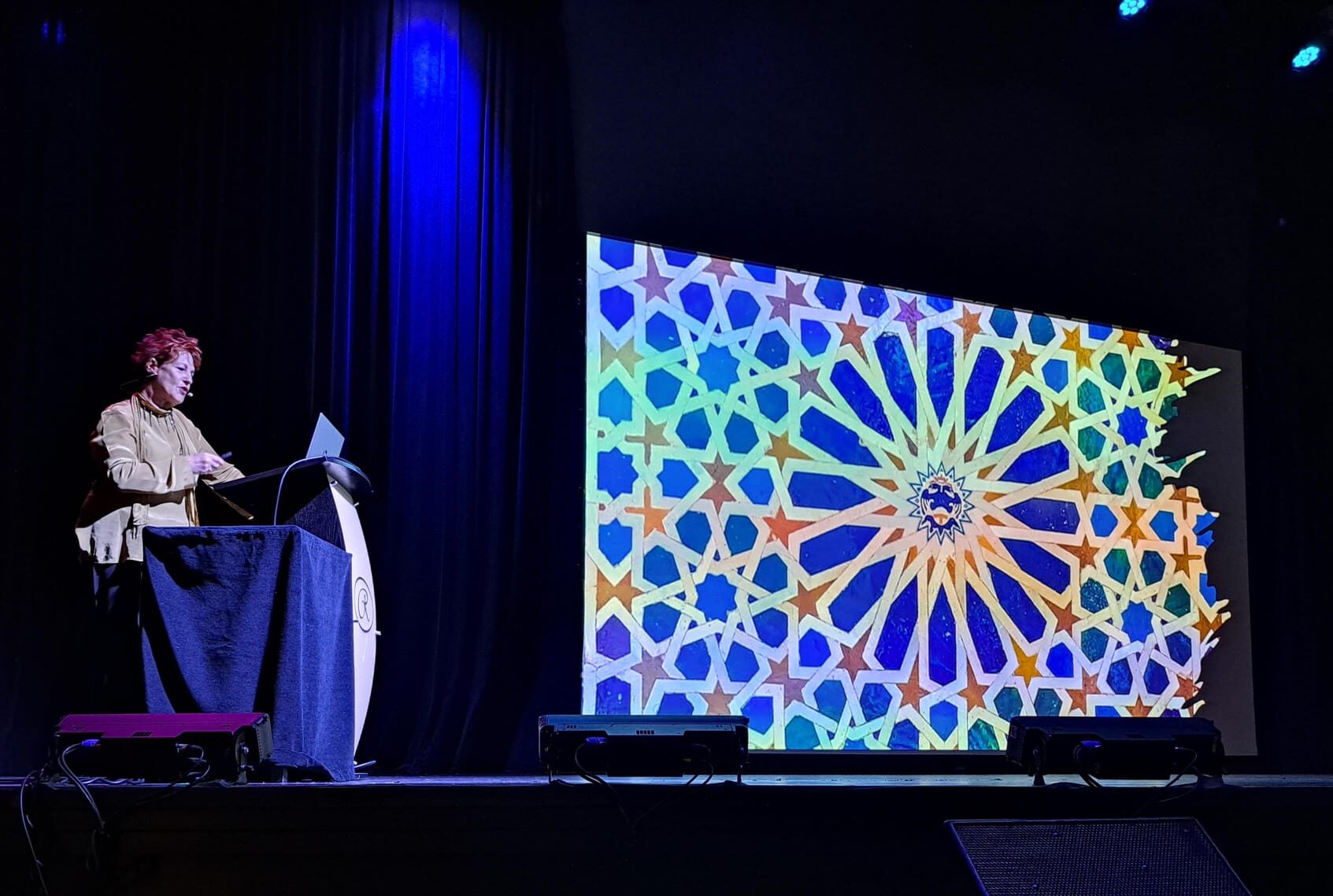 Louise Garman's talk slide showing a Moorish geometric star pattern
