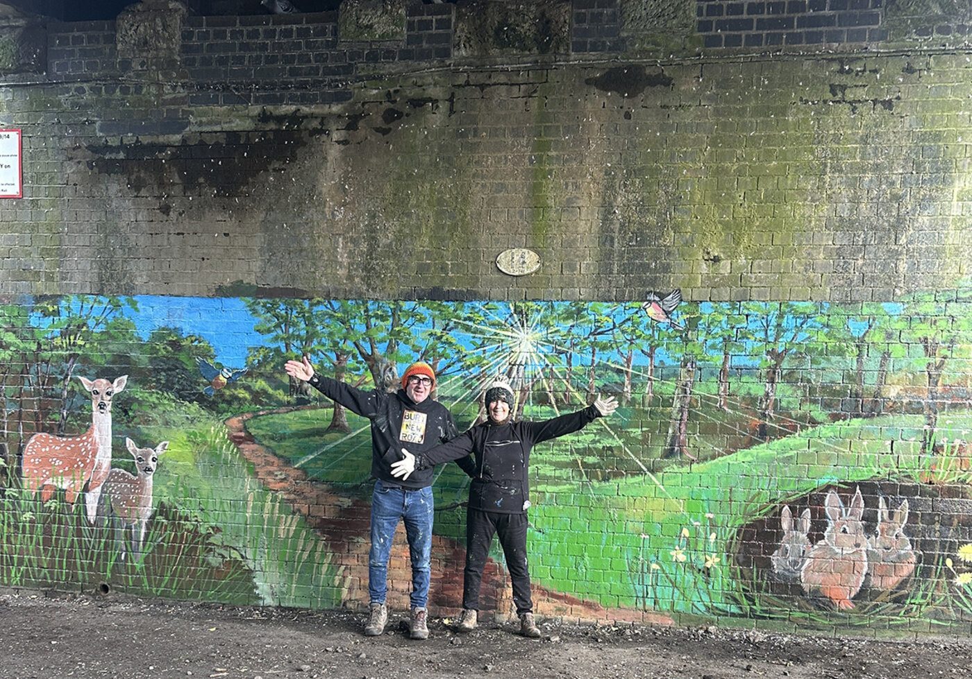 Louise Garman and a friend at the mural unveiling