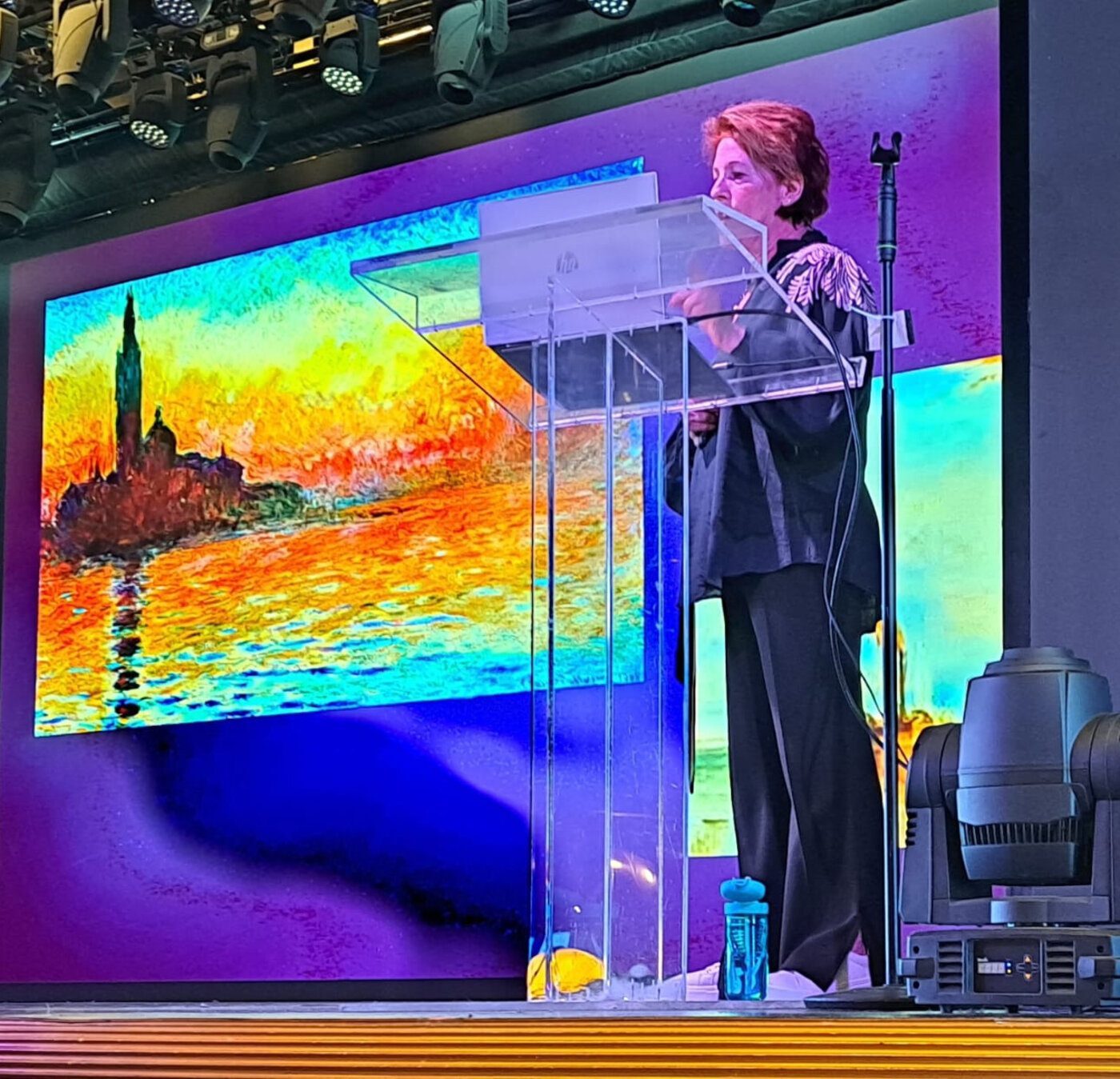 Louise Garman presenting a Monet-style Venice image