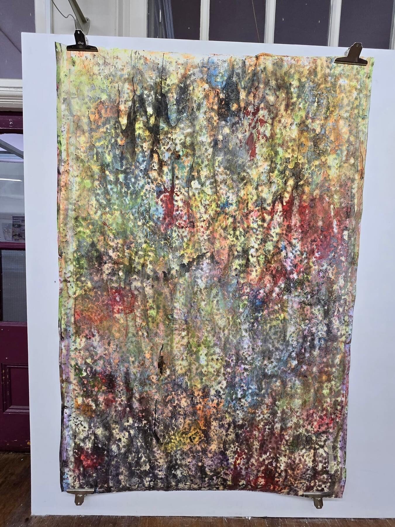 A colourful mixed media artwork by Louise Garman on display at the NEO: Artists O-P-E-N Exhibition 2024