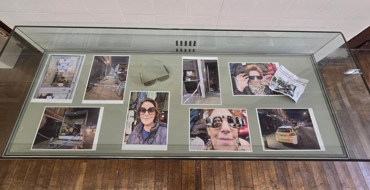 Louise Garman's display case piece featuring sunglasses, street photographs and self-portraits