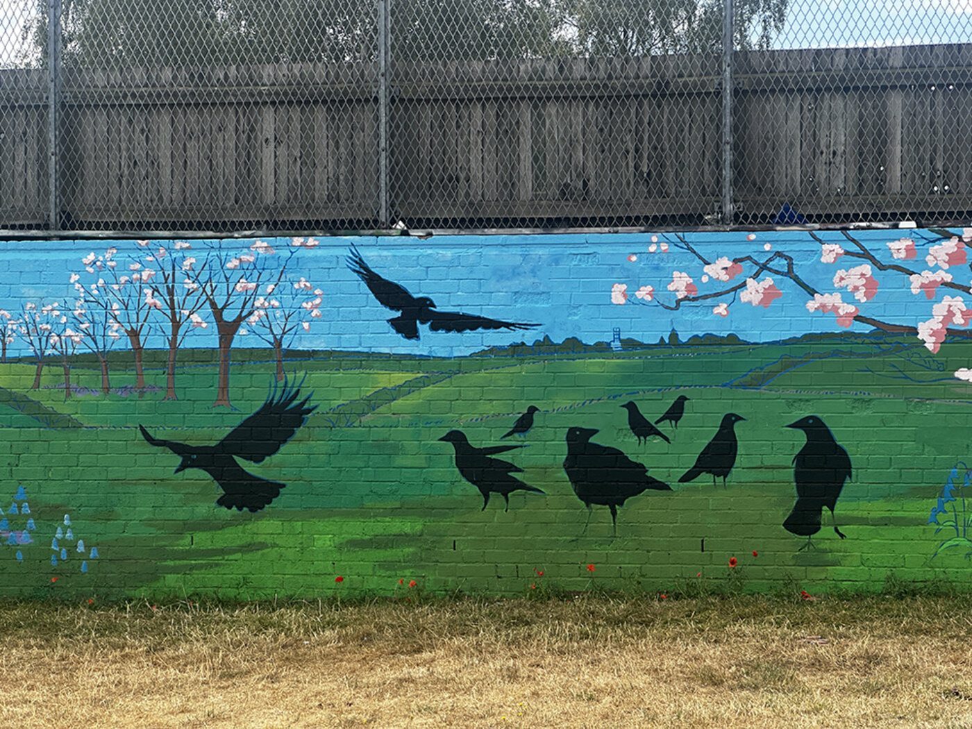 Detail of the crows and blossom section of the mural