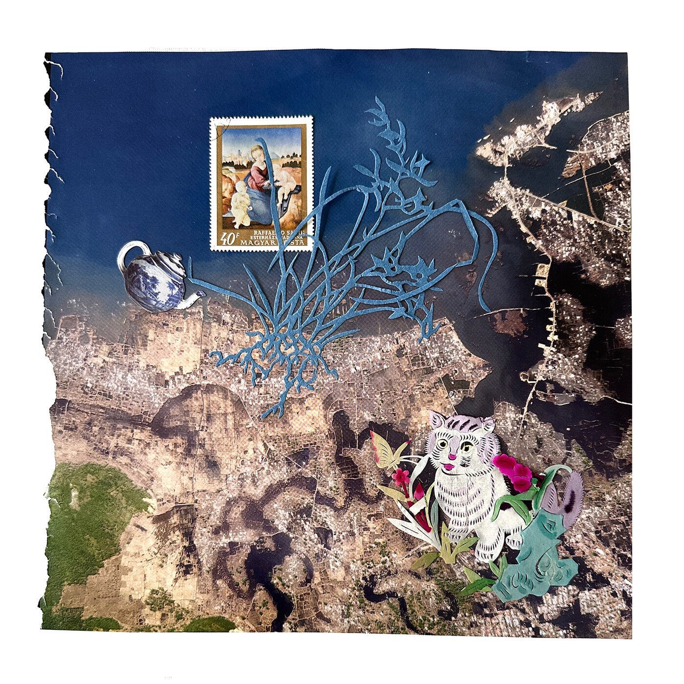 Mixed-media collage with aerial map, teapot and cat cut-out